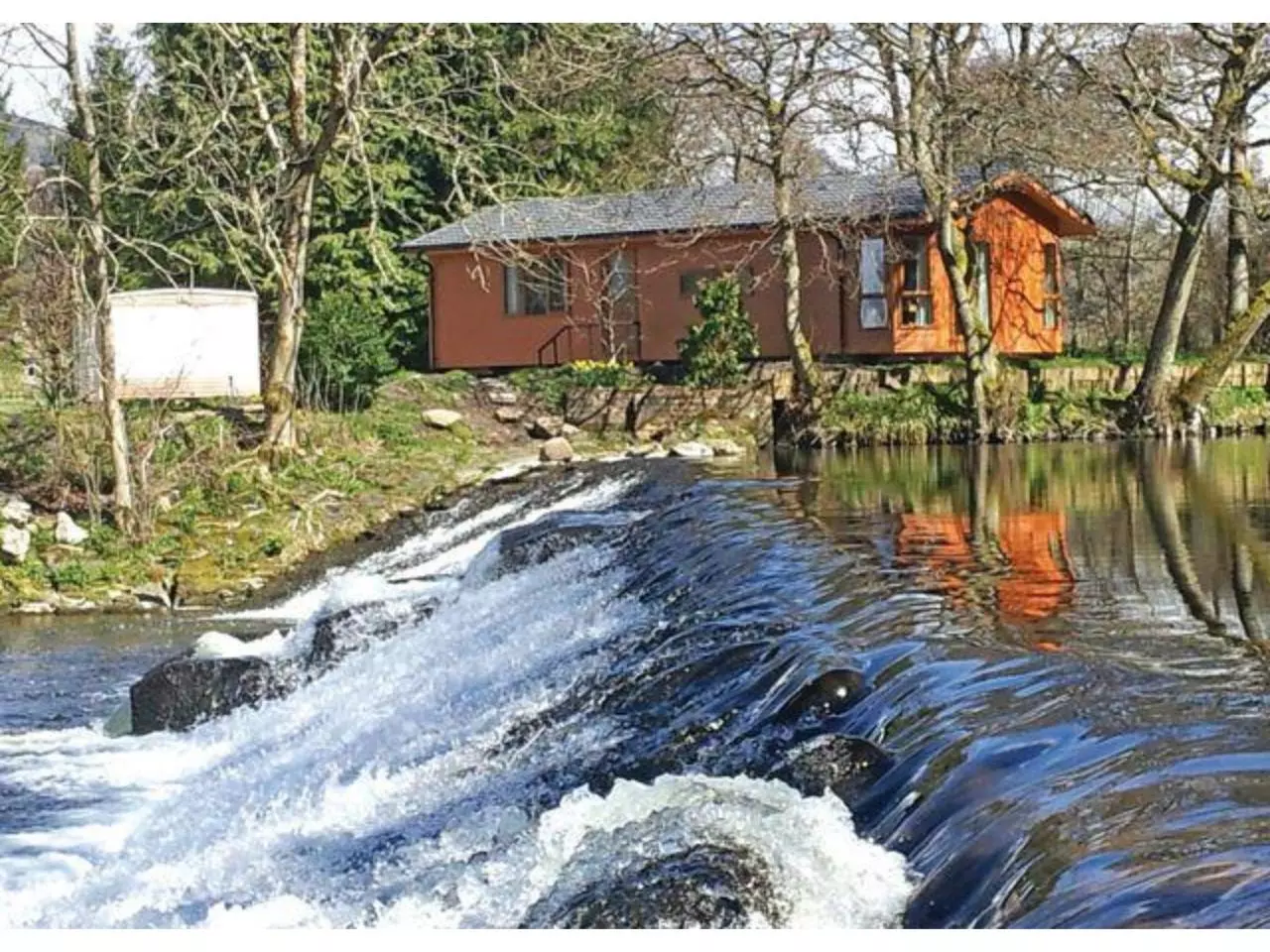 Page 4 of 8, Dollar Riverside Lodges