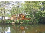 Page 5, Dollar Riverside Lodges