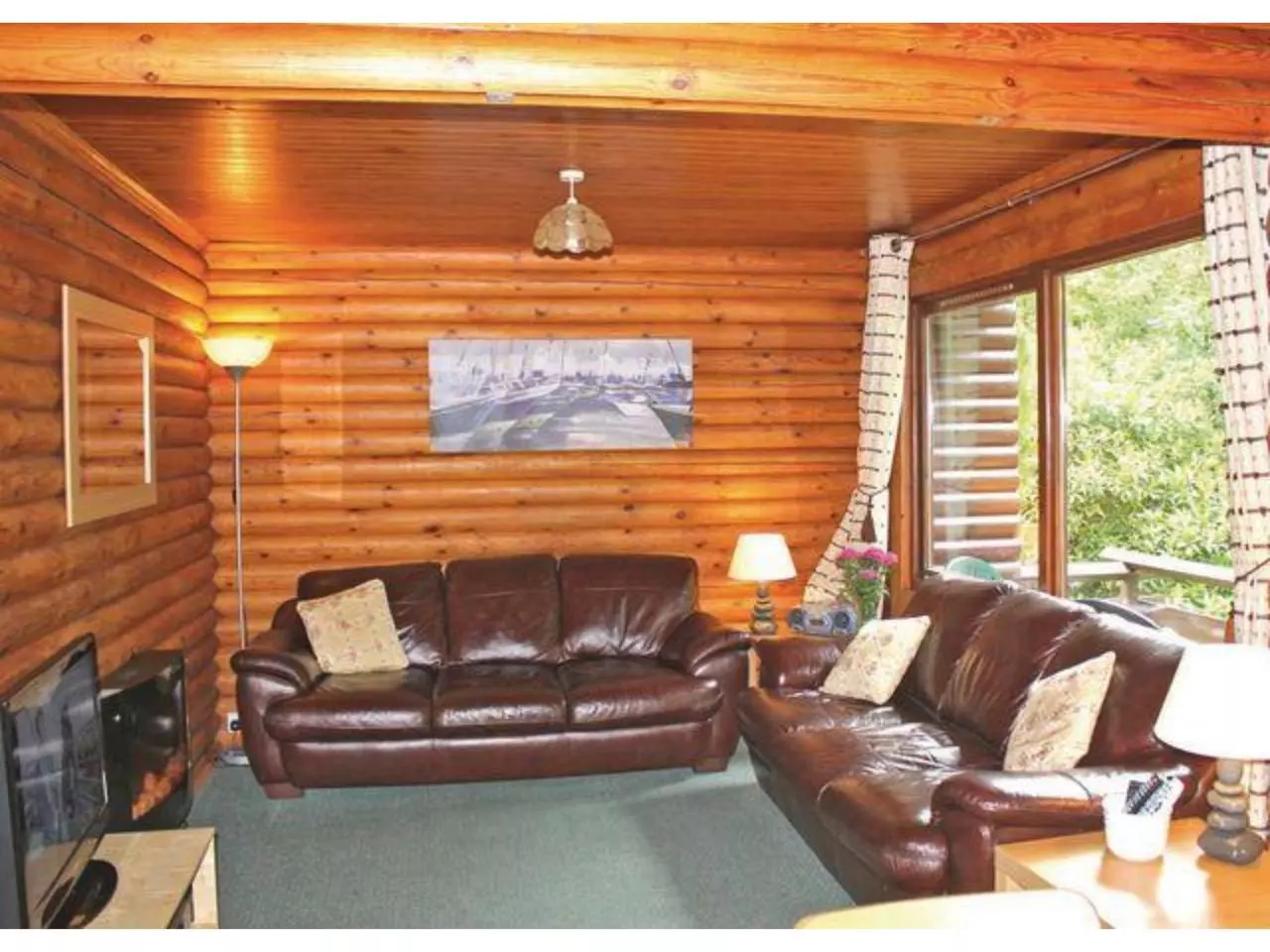 Page 3 of 8, Riverside Log Cabins