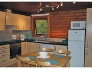 Page 2, Riverside Log Cabins