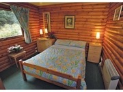 Page 4, Riverside Log Cabins